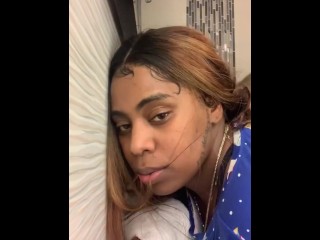 Woman with rounded behind engaged in intimacy in restroom.